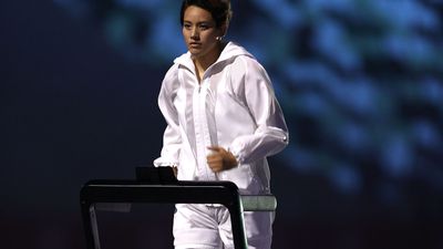 Arisa Tsubata runs on a treadmill during the Opening Ceremony