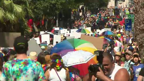 Fitzroy Street was filled with people after organisers brought  celebrations early due to the heat.