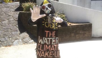 Protester Benny Zable says "Obama had better listen", demanding action on climate change. Mr Zable was one of many activists demanding notice from world leaders attending the G20 summit in Brisbane. (9NEWS)