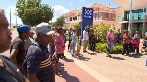 About 100 people gathered outside the Geraldton Police Station.