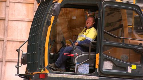 The situation left nearby construction workers roaring with laughter. (9NEWS)
