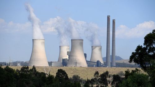 Energy Australia the closure of coal-fired power stations for the price increase. (AAP)