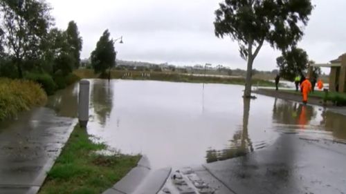 A Craigieburn street has been inundated after heavy rainfall. (9NEWS)