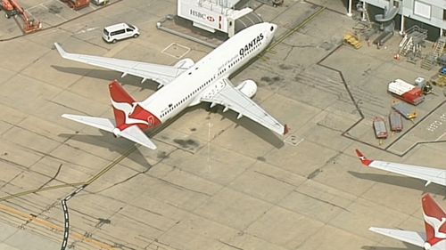 The Qantas plane landed safely at Melbourne Airport.