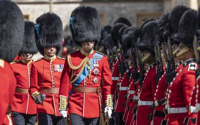 The Duke of Cambridge, Colonel of the Irish Guards, inspects the 1st battalion in the Quadrangle of Windsor Castle before presenting the regiment with their new colours. Tuesday May 17, 2022.  