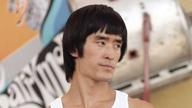 Mike Moh as Bruce Lee.