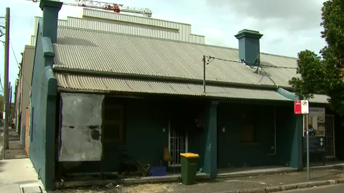 The officers were driving along Church Street in Camperdown when they noticed the blaze. (9NEWS)