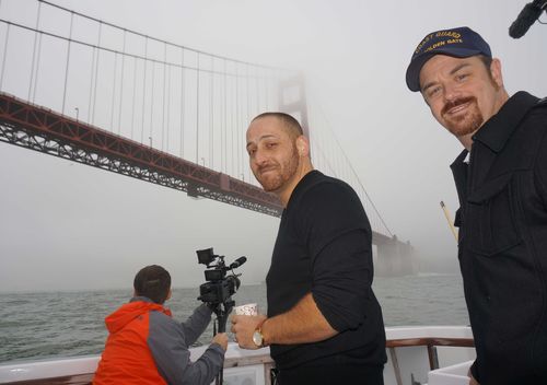 Kevin Hines (centre) with the coastguard who pulled him from the water after he jumped from the Golden Gate Bridge in September, 2000. (Supplied)