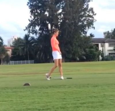 Click through to watch a video of her actually hitting the ball too long.