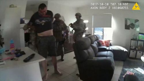 Bodycam footage showed the 44-year-old locked in a struggle with police during a drug raid. Picture: 9NEWS