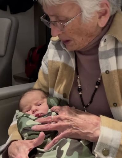 Elinor Hanson who has dementia singing to great-grandson