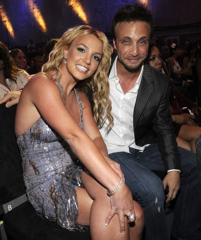 Britney Spears and Larry Rudolph in the audience at the 2008 MTV Video Music Awards at Paramount Pictures Studios on September 7, 2008 in Los Angeles, California.  (Photo by Kevin Mazur/WireImage)