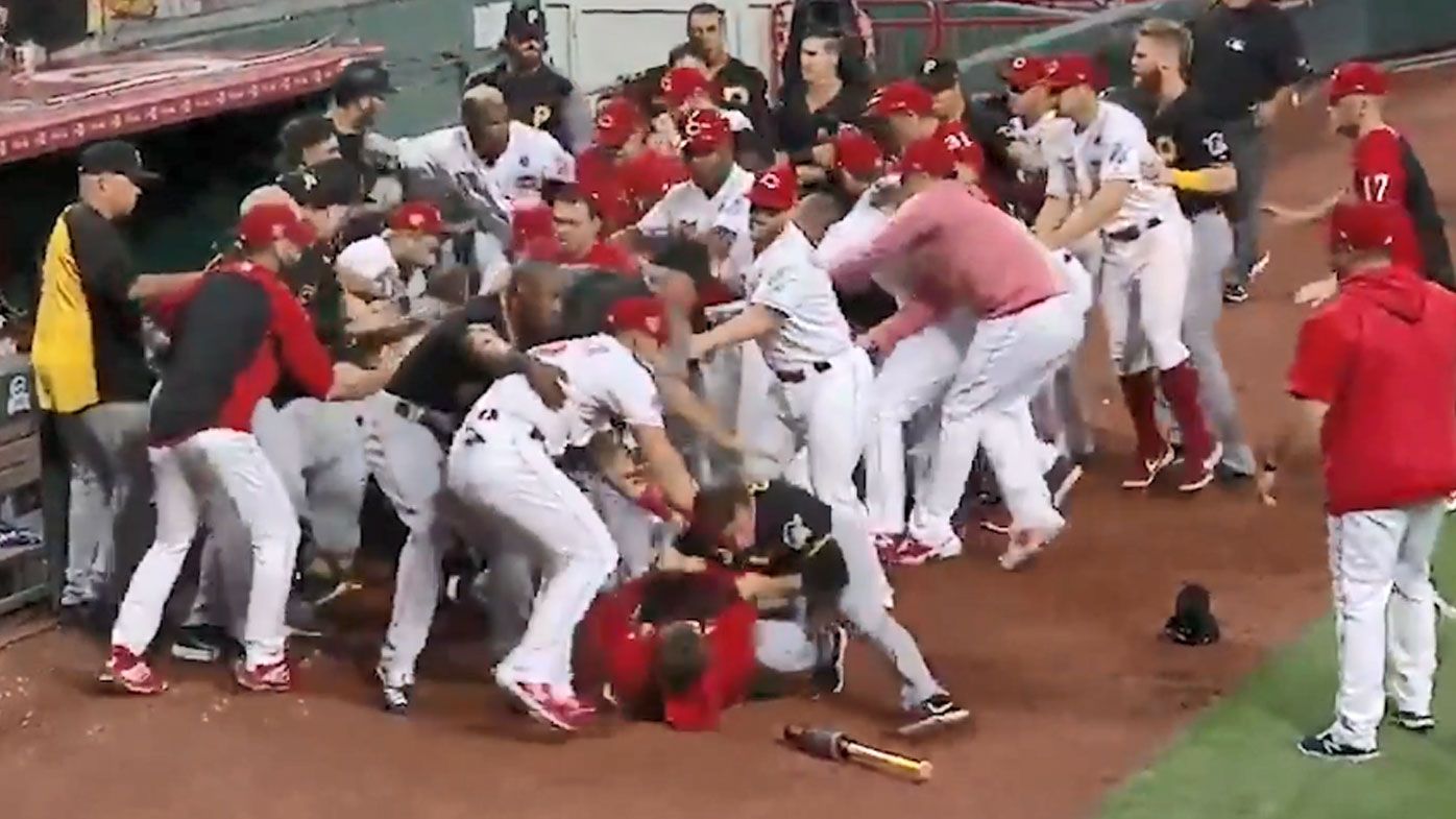 Reds and Pirates players fight in a massive brawl