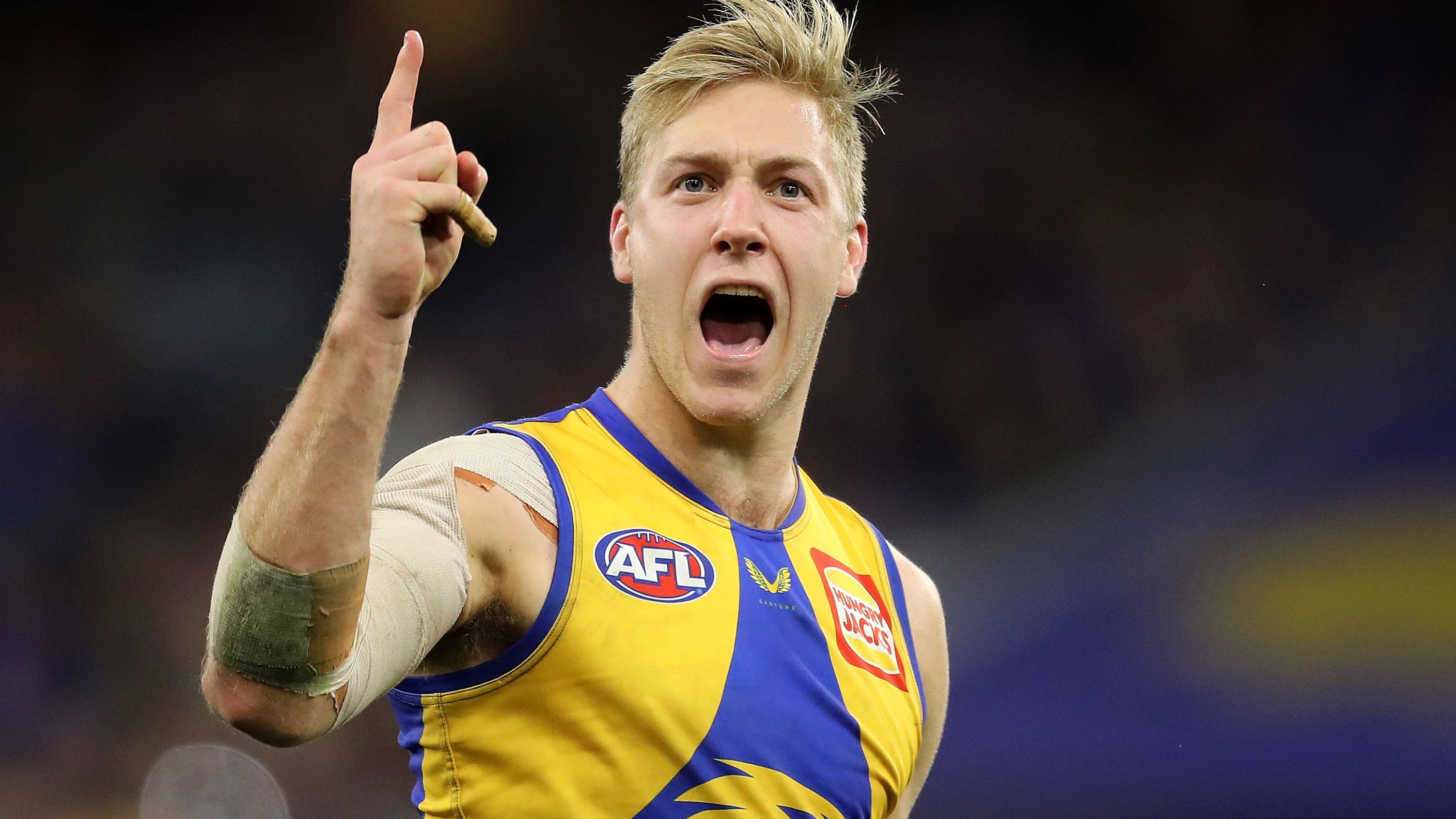 PERTH, AUSTRALIA - JUNE 13: Oscar Allen of the Eagles celebrates after scoring a goal during the 2021 AFL Round 13 match between the West Coast Eagles and the Richmond Tigers at Optus Stadium on June 13, 2021 in Perth, Australia. (Photo by Will Russell/AFL Photos)