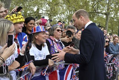 Prince William greets well-wishers outside Buckingham Palace