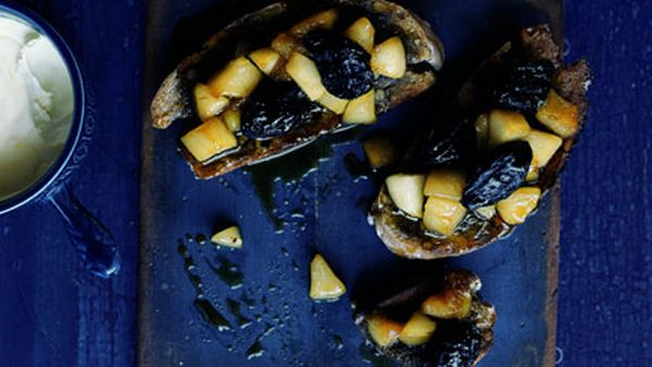 Baked pear and walnut tartines with frontignac, prunes and clotted cream