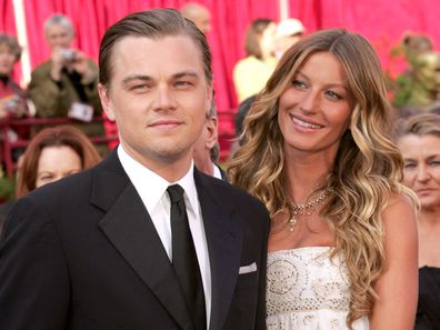 Leonardo DiCaprio, nominee Best Actor in a Leading Role for The Aviator, and Gisele Bundchen (Photo by KMazur/WireImage)