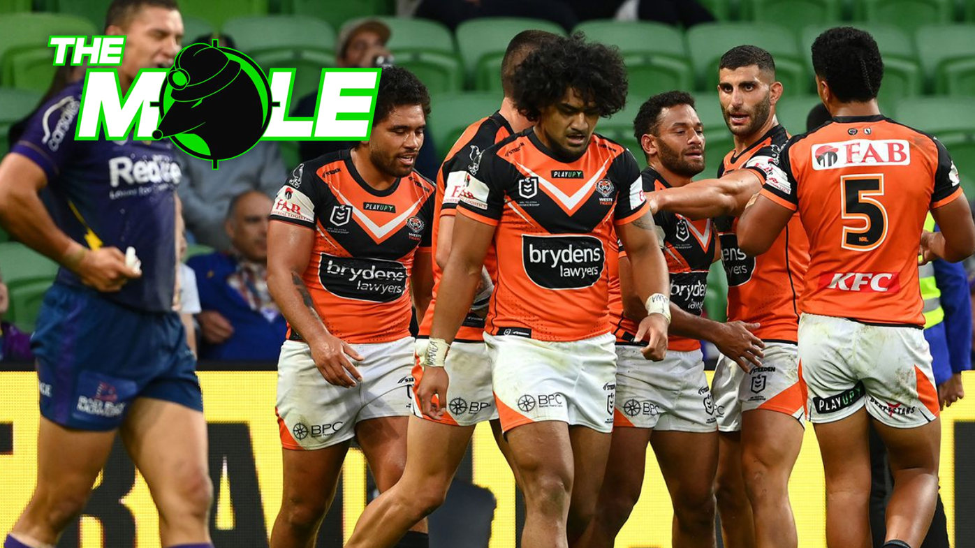 Apisai Koroisau celebrates with Tigers teammates after scoring a try during their round four NRL match against the Melbourne Storm. 