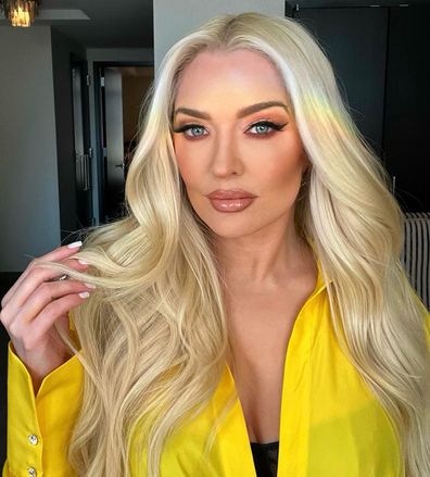 Reality TV star Erika Jayne jokes she's now wearing her clothes twice amid divorce and legal woes.