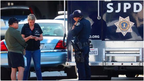 Investigators take a witness statement after a San Jose man allegedly killed himself and four family members including his in-laws.