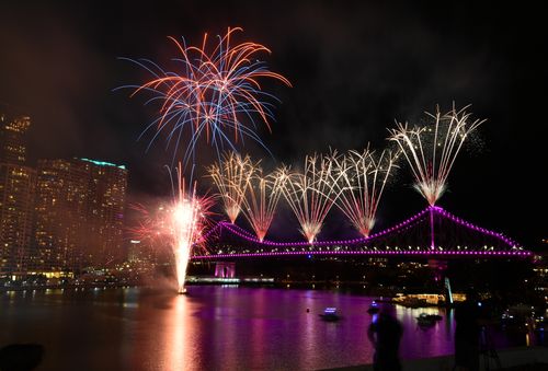 After a stormy Sunday, Brisbane's skyline will be mostly cloudy as the clock ticks over to 2018. (AAP)