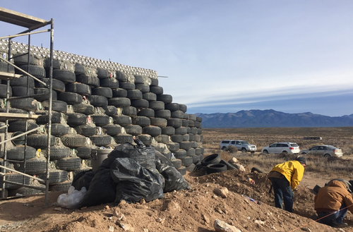 Earthship walls are made from tyres and soft drink cans. (9NEWS)