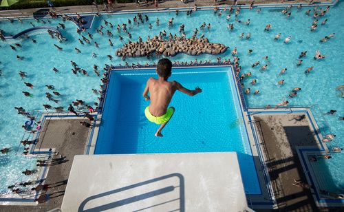 Pools and beaches are packed across parts of Europe.