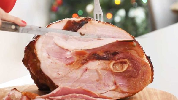 Carving the Christmas ham is a treat