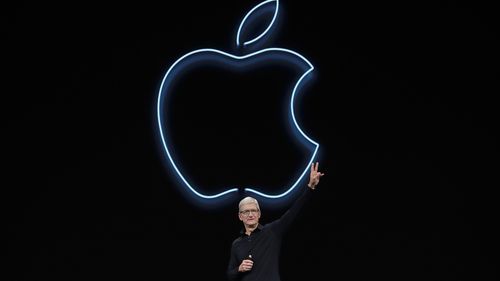 Apple CEO Tim Cook waves after speaking at the Apple Worldwide Developers Conference in San Jose, Calif., Monday, June 3, 2019. 