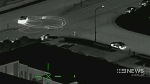 The Commodore was filmed doing burnouts by a police helicopter. (Queensland Police)