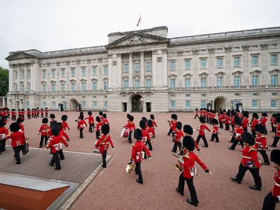 Members of the Nijmegen Company Grenadier Guards and the 1st Battalion the Coldstream Guards take part in the Changing of the Guard, in the forecourt of Buckingham Palace