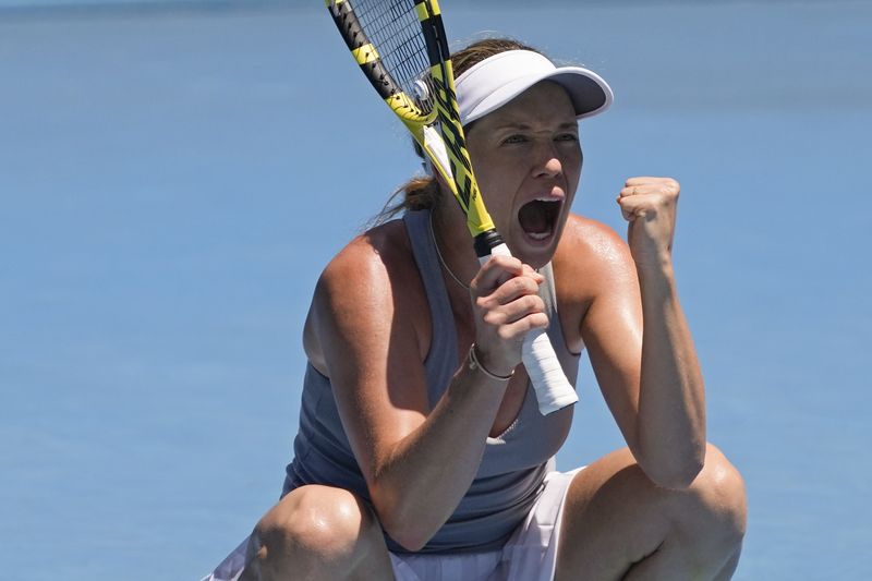 Danielle Collins of the U.S. reacts after defeating Alize Cornet of France in their quarterfinal match at the Australian Open.