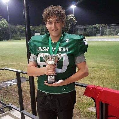 Marcus Vrondas young in a football jersey 