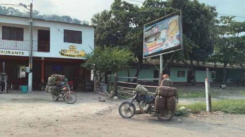 A motorcycle loaded with oil containers in Catatumbo, April 12, 2019. Illegal transportation of oil is one of theprimary activities in the Catatumbo region.