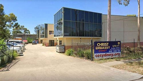 There were 60 people, adults and children, gathered at the Christ Embassy Church in Blacktown.