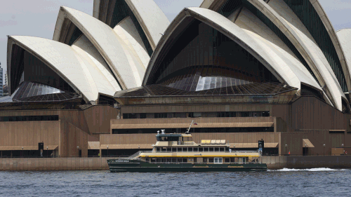 One of the Emerald-class ferries passing the Sydney Opera House.