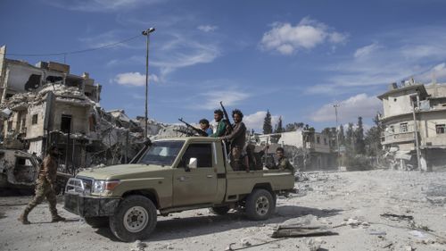 Members of the Free Syrian Army have worked to clear land mines from al-Bab. (AFP)