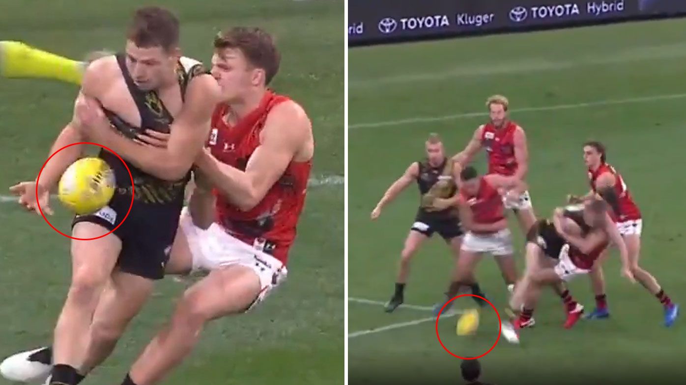 AFL umpires once again under fire over 'farcical' holding-the-ball inconsistencies