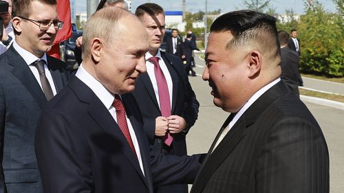 Russian President Vladimir Putin and North Korea's leader Kim Jong-un shake hands during their meeting at the Vostochny cosmodrome.