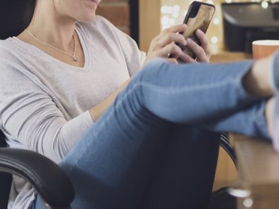 Woman on phone at home