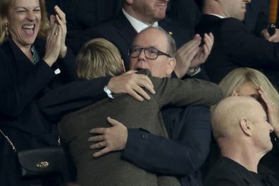 PARIS, FRANCE - OCTOBER 28: Princess Charlene of Monaco and Prince Albert II of Monaco hug each other to celebrate the victory of South Africa at full time following the Rugby World Cup France 2023 Final between New Zealand (All Blacks) and South Africa (Springboks) at Stade de France on October 28, 2023 in Saint-Denis near Paris, France. (Photo by Jean Catuffe/Getty Images)