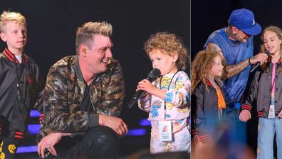 Backstreet Boys on stage with kids. 