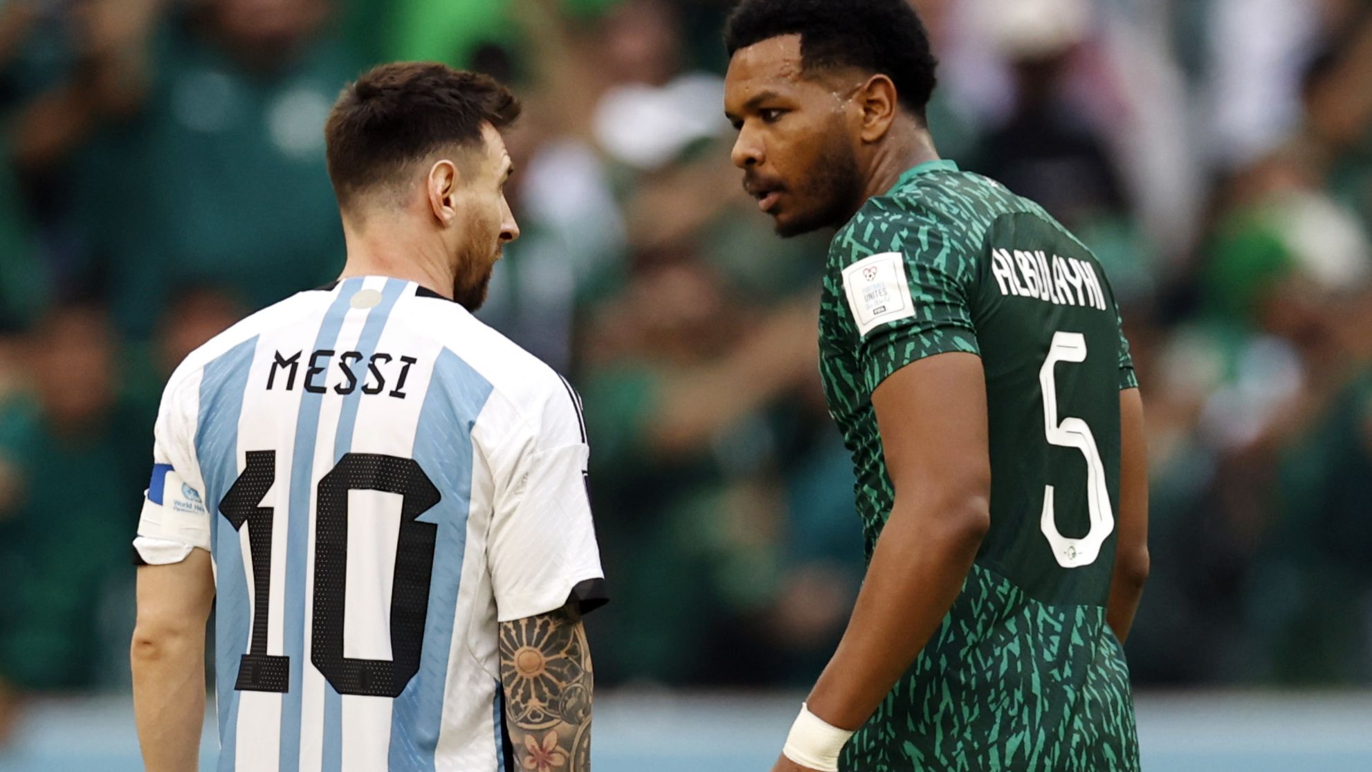 LUSAIL CITY - (l-r) Lionel Messi of Argentina, Ali Al Bulayhi of Saudi Arabia during the FIFA World Cup Qatar 2022 group C match between Argentina and Saudi Arabia at Lusail stadium on November 22, 2022 in Lusail City, Qatar. AP | Dutch Height | MAURICE OF STONE (Photo by ANP via Getty Images)