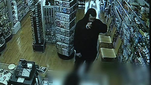 Police wish to speak to this man, caught on CCTV in a Sydney pharmacy. (9NEWS)