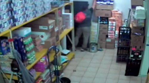 Security cameras were rolling when the thief broke in through the rear door of the Baldivis deli on November 29. (9NEWS)