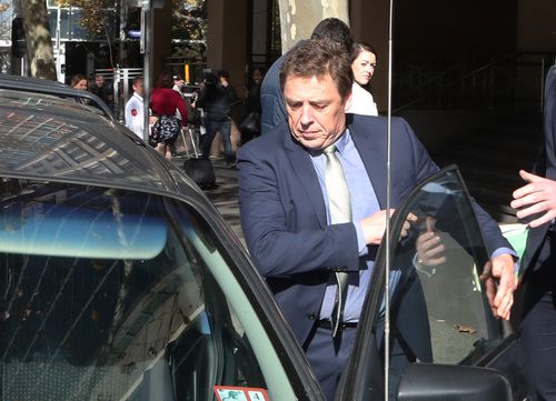 Mark 'Bomber' Thompson has slipped in and out of Melbourne Magistrates Court today. Picture: AAP