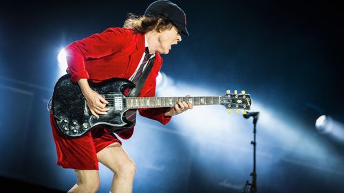 Guitarist Angus Young of AC/DC performs on stage during the legendary Australian rock band's 'Rock or Bust' World Tour at Etihad Stadium on December 6, 2015 in Melbourne, Australia.