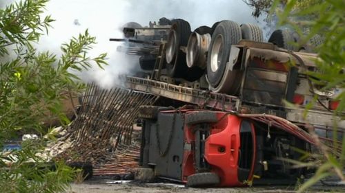 The semi-trailer was travelling north on the Pacific Highway when it is believed to have veered off the road. (9NEWS)