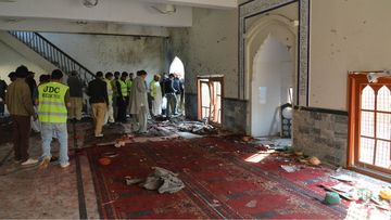 A massive bomb blast at a mosque in southern Pakistan has killed more than 60 people. (AAP)