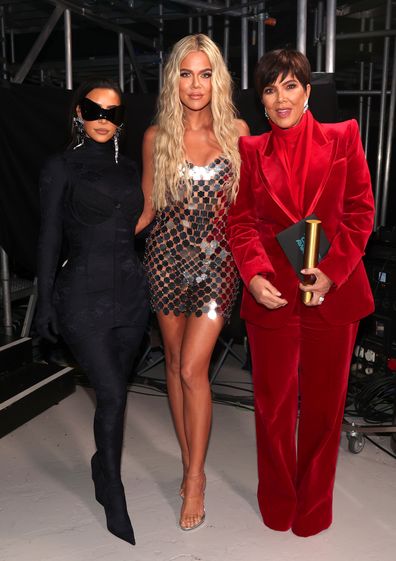 Kim Kardashian West, Khloé Kardashian, and Kris Jenner, winners of The Reality Show of 2021 award for Keeping Up With the Kardashians, pose during the 2021 People's Choice Awards held at Barker Hangar on December 7, 2021 in Santa Monica, California. 